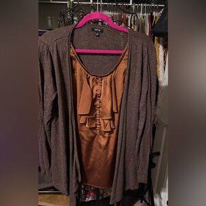 This is an Apt. 9 women's long-sleeve cardigan sweater with a ruffled sleeveles